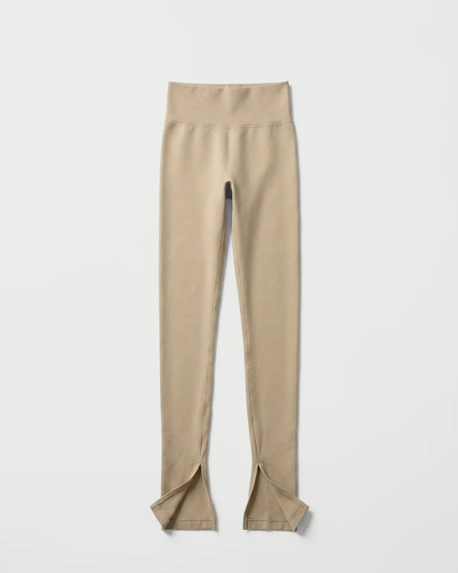 Beige leggings with a slit on a white background %Cream%