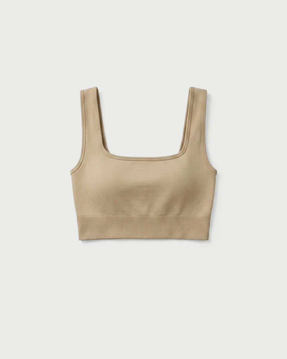 Beige crop top on a light beige background %Cream%