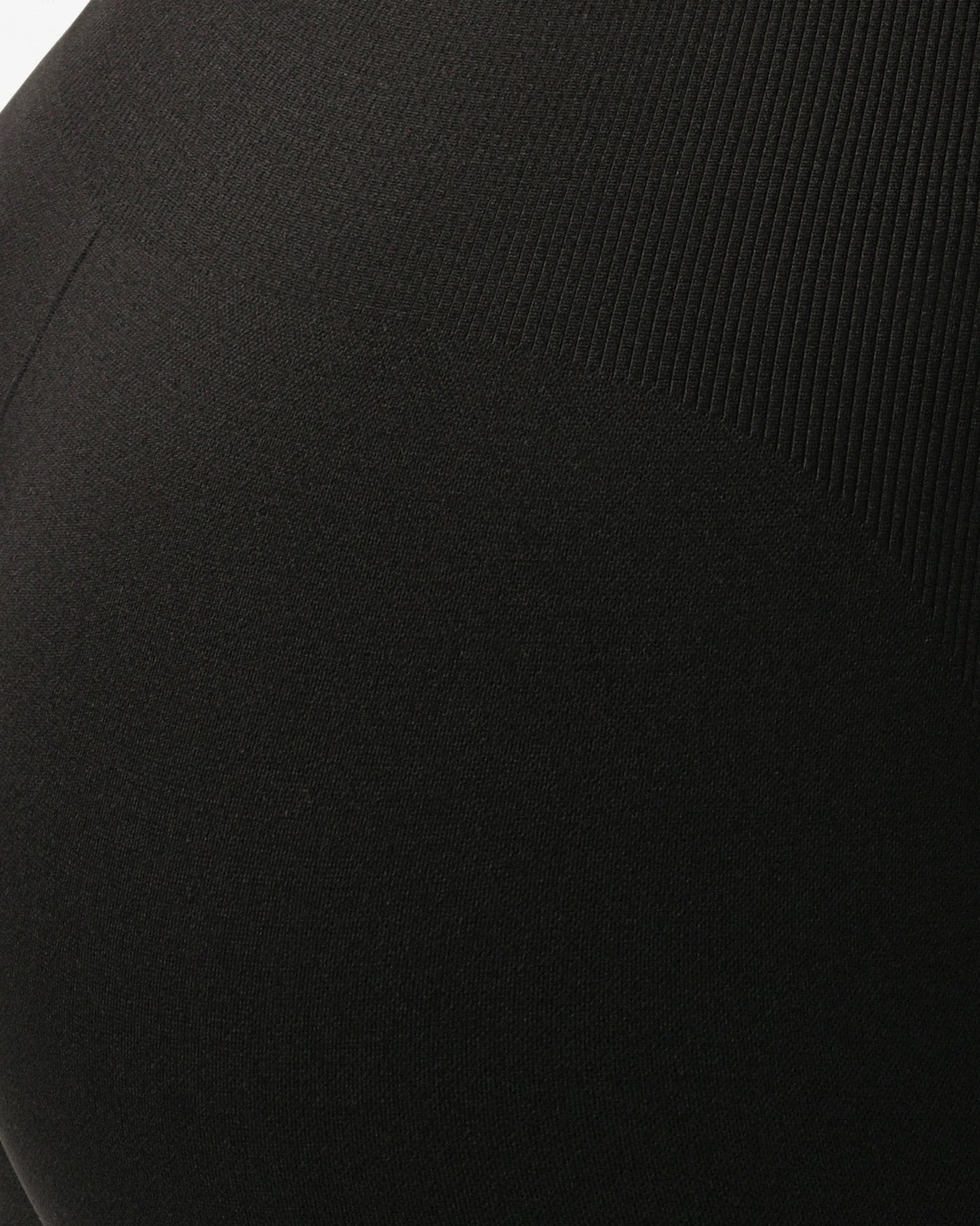 Close-up of a black textured fabric surface %Black%