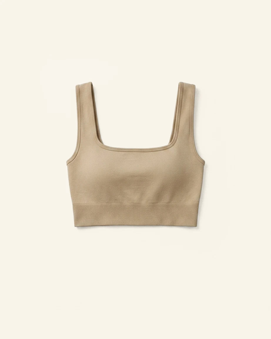 Beige crop top on a light beige background %Cream%